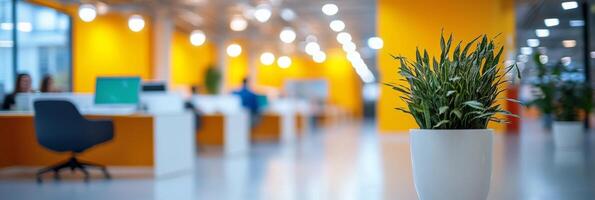 Bright modern office space with creative workstations and plants during daytime hours photo