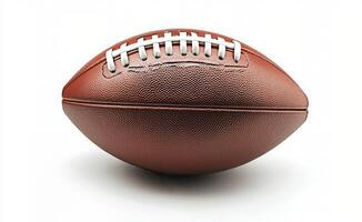 A close up view of a classic brown football displayed on a clean white background photo