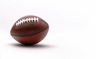 A close up view of a classic brown football displayed on a clean white background photo