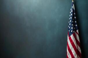 American flag displayed against a dark background in an indoor setting during daylight photo