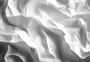Textured white paper layers creating a delicate and intricate pattern in soft lighting photo