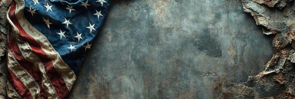 Worn American flag draped over a textured surface, symbolizing patriotism and history photo