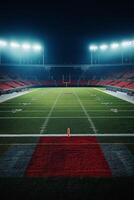 A vibrant football stadium under bright lights with an expansive green field during nighttime photo