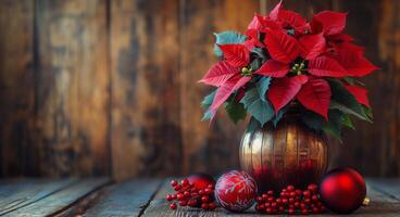 Poinsettia arrangement with red ornaments on a wooden table during the holiday season photo