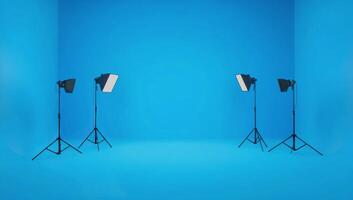 Studio setup with softboxes illuminating a blue backdrop for photography sessions photo