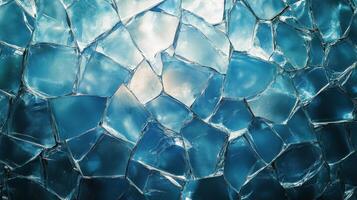 Bright blue ice shards create a striking pattern in a frozen landscape during daylight hours photo