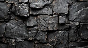 Textured stone wall with uneven slabs arranged in a rustic pattern for interior design ideas photo