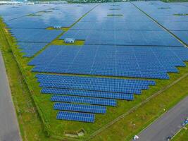 Top view of Solar panels on farm. Alternative source of electricity. solar panels absorb sunlight as a source of energy to generate electricity creating sustainable energy photo