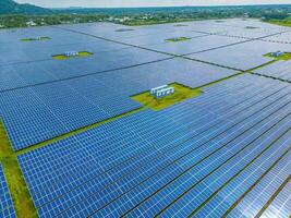 Top view of Solar panels on farm. Alternative source of electricity. solar panels absorb sunlight as a source of energy to generate electricity creating sustainable energy photo