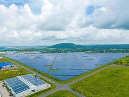 Top view of Solar panels on farm. Alternative source of electricity. solar panels absorb sunlight as a source of energy to generate electricity creating sustainable energy photo