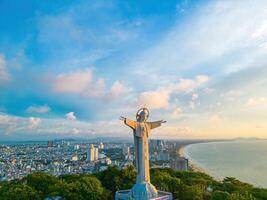 Top view of Vung Tau with statue of Jesus Christ on Mountain . the most popular local place. Christ the King, a statue of Jesus. Travel concept. photo
