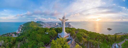 Top view of Vung Tau with statue of Jesus Christ on Mountain . the most popular local place. Christ the King, a statue of Jesus. Travel concept. photo