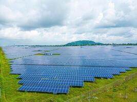 Top view of Solar panels on farm. Alternative source of electricity. solar panels absorb sunlight as a source of energy to generate electricity creating sustainable energy photo