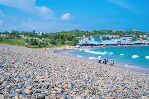 Bay Mau beach at Mui Ne, Binh Thuan. Sea stone pebble background. Abstract nature background with pebble stones. Full frame shot of multicolored pebbles. Close-up. photo