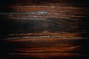 Dark wood texture background surface with old natural pattern. Walnut wood texture. Close up walnut planks texture background. photo