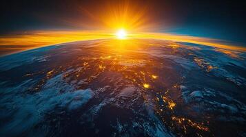 Golden rays illuminate the horizon, revealing the beauty of our planet at dawn photo