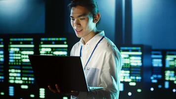 Computer scientist strolling through server rows providing processing resources for different workloads. System administrator monitoring supercomputers tasked with solving complex operations photo