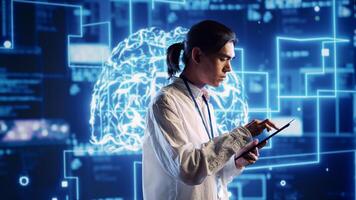 Hardworking system administrator in data center uses artificial intelligence computing simulating human brain thought processes. Server room manager works on tablet with AI machine learning algorithms photo