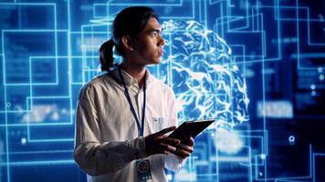 Developer working with artificial intelligence computerized model simulating human brain. Worker looking at AI visualization showing machine learning algorithms using pattern recognition photo