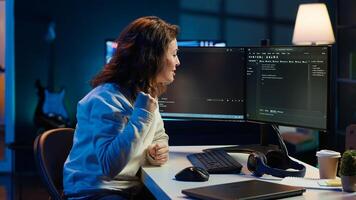 Happy developer celebrating after managing to secure company servers from virus attacks. Cheerful IT employee throwing fist in air from excitement after building firewalls protecting data, camera A photo