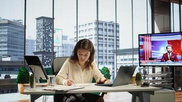 Female leader with executive power signing work contracts and approving employees requests, daily paperwork tasks for productivity. Authorization for leave request or license agreement. Camera B. photo