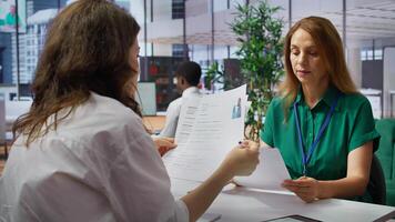 Team of recruiters working together to choose the right applicant with the best qualifications to fill in the vacancy. HR experts selecting candidates based on their resume, job offer. Camera B. photo