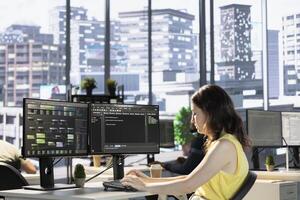 Employee conducting code review to fix bugs, identifying performance and technical issues with machine learning company software. IT specialist debugging and optimizing neural network code photo
