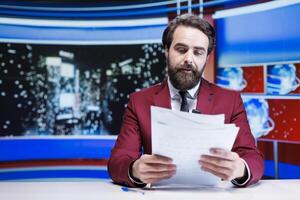 Anchorman on midnight talk show presenting latest events on international tv program, broadcasting information for television content. Entertainment segment host reading daily headlines. photo