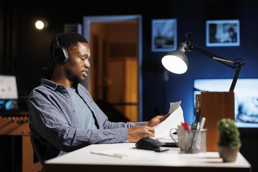 Financial analyst examines profit state on economy records files, working from home and helping increase business revenue. Advisor looking at capital funds and planning new development strategy. photo
