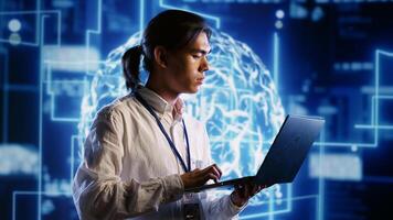 Capable IT contractor works with artificial intelligence computerized model simulating human brain. Tech support man looks at AI visualization of machine learning algorithms using pattern recognition photo
