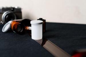 Vintage Camera with Film Roll and Canister photo