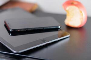 Modern Tablet and Smart phone with Apple photo