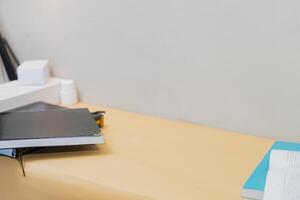 Minimalist Workspace With Notebooks and Open Book photo