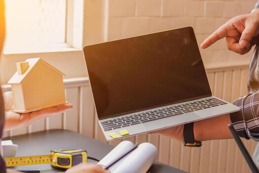 Work equipment placed on desk in office of team of engineers and architects design large construction project to meet needs of investors and check feasibility of project by an architect with expertise photo