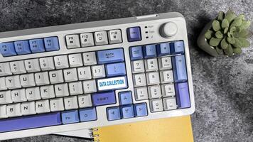 Data Collection write on keyboard isolated on laptop background photo