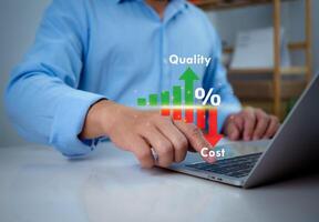 Businessman touching showing a quality control growth graph and cost reduction, Cost and quality control, Effective business, business strategy and project management concept. photo