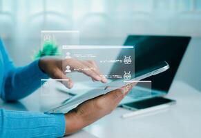 Human hand using tablet touching a virtual screen displaying questions and answers with artificial intelligence, Machine learning, AI technology, AI brain network in business analysis. photo