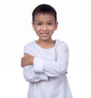 Portrait of asian boy wearing a white shirt posing showing happiness isolated on white background. photo