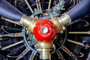 detail of old airplane engine with propeller photo