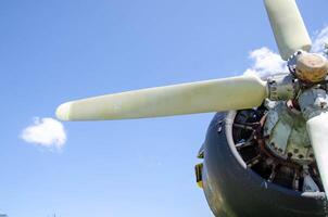 detail of old airplane engine with propeller photo