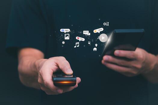 The concept of using digital media, technology, and social media. Surfing online, male hand using smartphone To play or use social media, remote work concept, work from home via the Internet photo