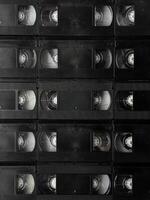 Retro black vhs tape collection capturing vintage analog nostalgia photo