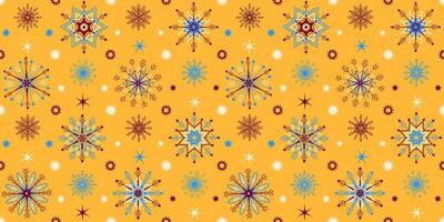 Colored snowflakes and stars on a yellow background. Seamless winter pattern. vector