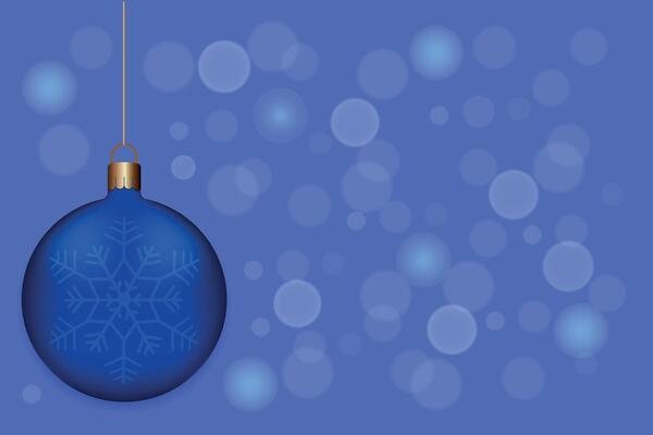 New Year's ball on a blue background with bokeh effect.