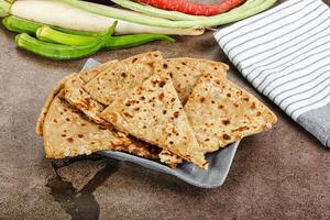 Indian Aloo Paratha - bread with potato photo