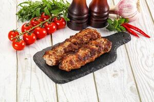 Chicken kebab minced meat and spices photo