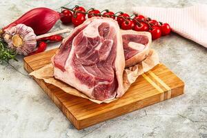 Raw pork knuckle for roast photo