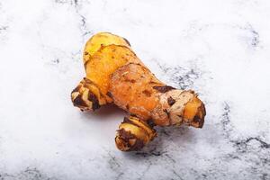Fresh curcuma root for cooking photo