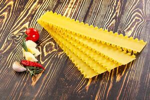 Uncooked raw Lasagna dry sheets photo