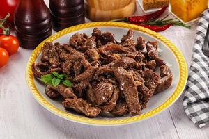 Stew beef slices with gravy photo